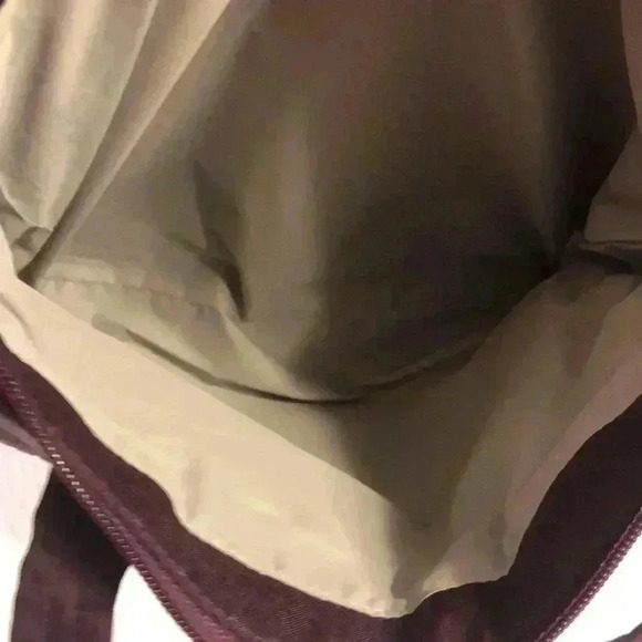 Magellan’s purple nylon shoulder bag. - Picture 7 of 12